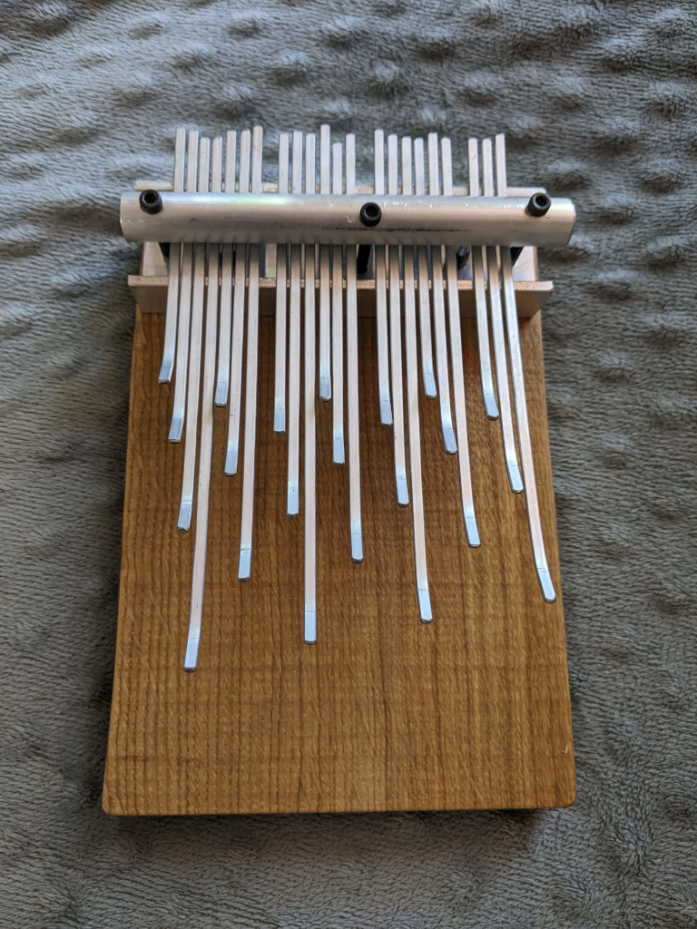 The 11-limit just intonation kalimba I made and sold to a friend.